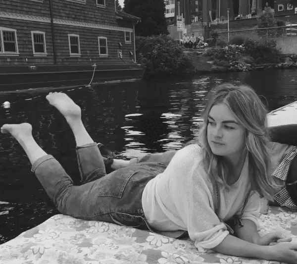 Gif of Michelle dipping feet in water